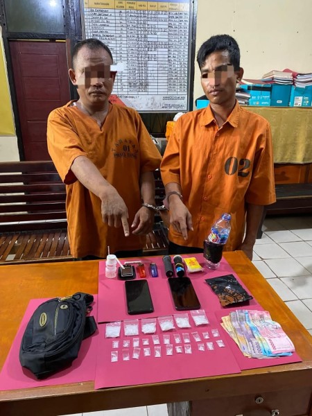 Polsek Tapung Ringkus Dua Pengedar Sabu di Kebun Sawit, 38,13 Gram Sabu Diamankan
