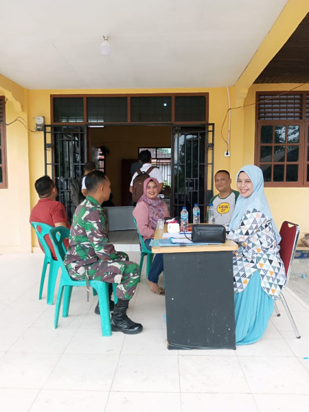 Sertu Sareh Laksanakan Pengamanan Rapat Rekapitulasi di Tingkat PPK